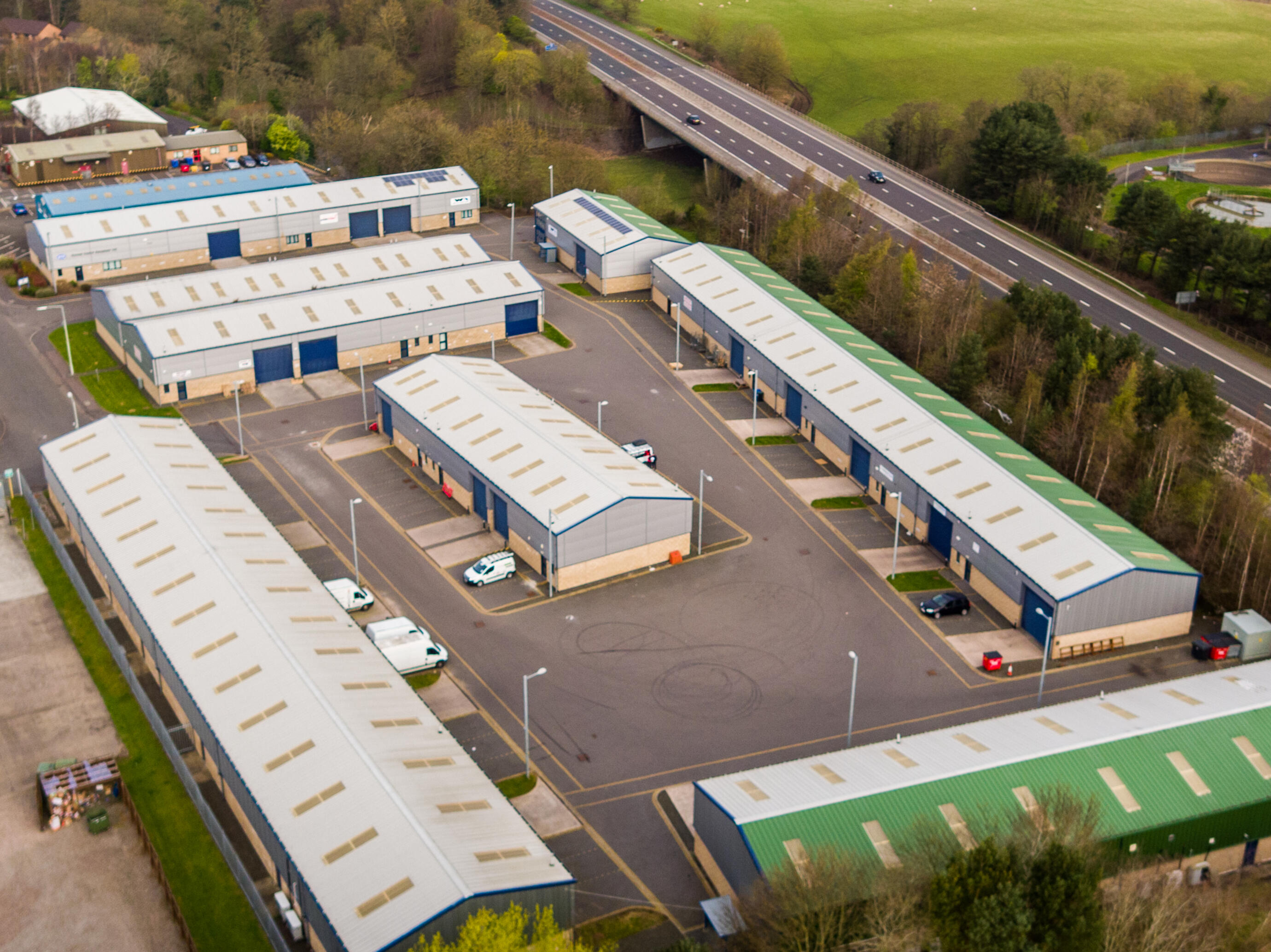 Aerial View of E Net Park at Mill Road Industrial Estate Linlithgow Aerial view of E Net Park at Mill Road Industrial Estate in Linlithgow with the motorway running alongside.
