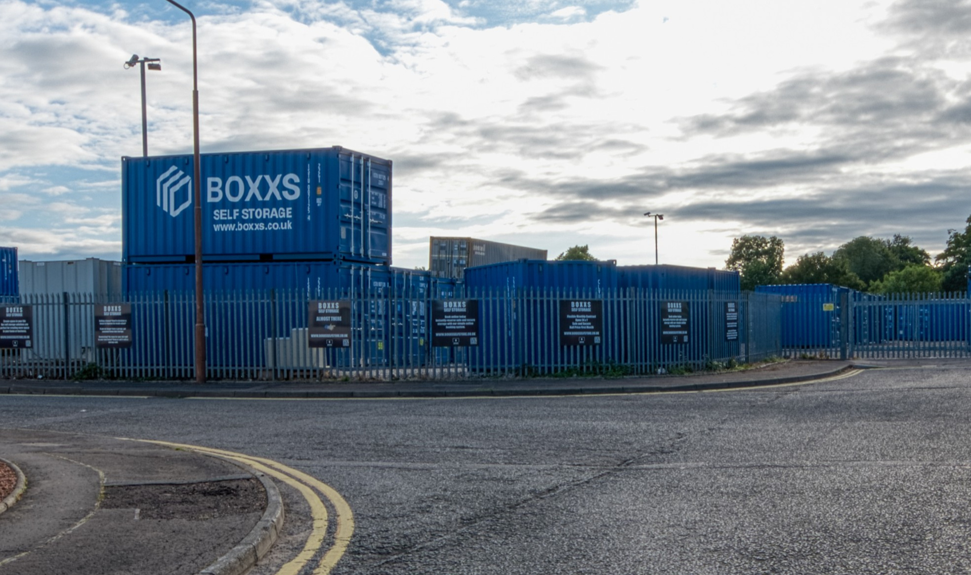 Boxxs self storage entrance with branded container at Linlithgow Alternate angle of Boxxs self storage container with painted logo at the Linlithgow entrance, highlighting secure access for Linlithgow and Bo'ness customers